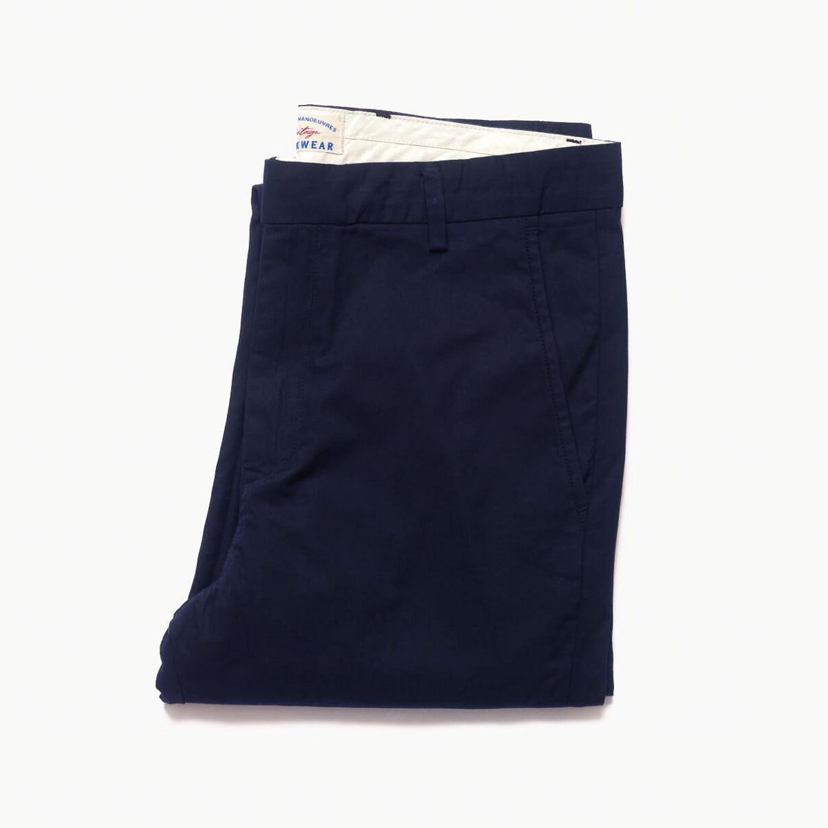 Chino Gabardine Marine plié, laissant voir la ceinture doublée écru et l'étiquette Workwear