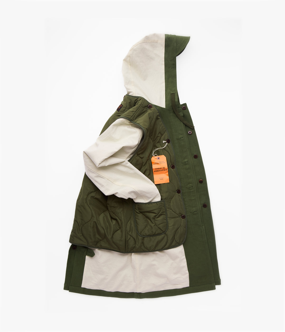 Parka fishtail homme en moleskine de profil, doublure écrue de la capuche et gilet matelassé
